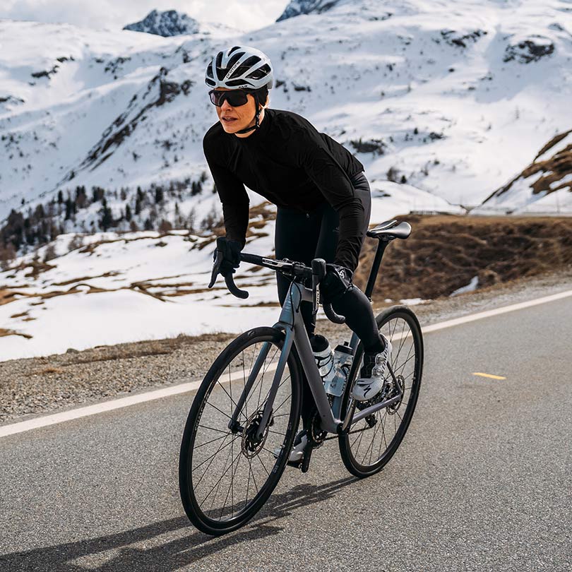 A woman wearing cycling gear