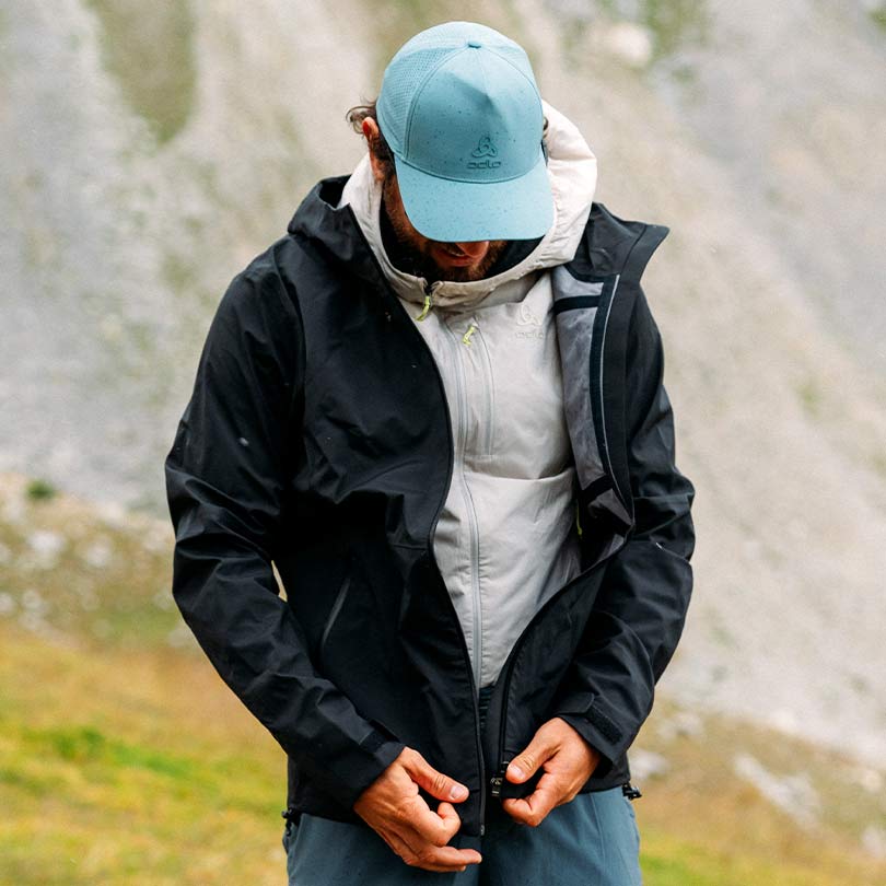 A man wearing a hiking jacket
