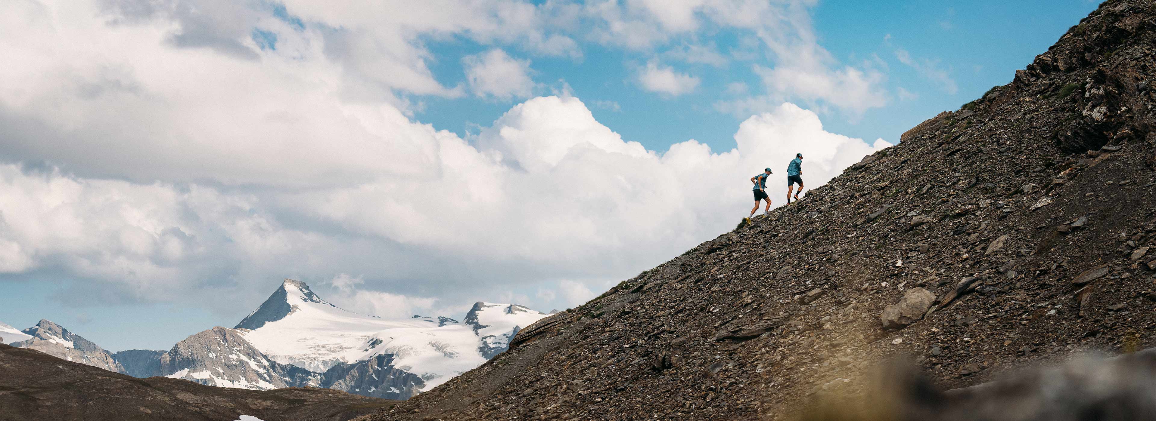Team X Alpi running up a mountain