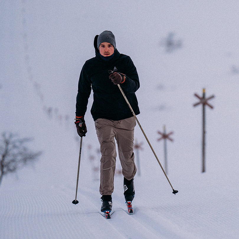 A man wearing cross-country outfit