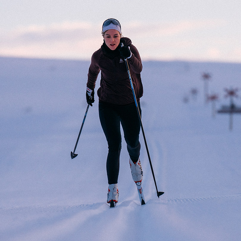 A woman wearing cross-country outfit